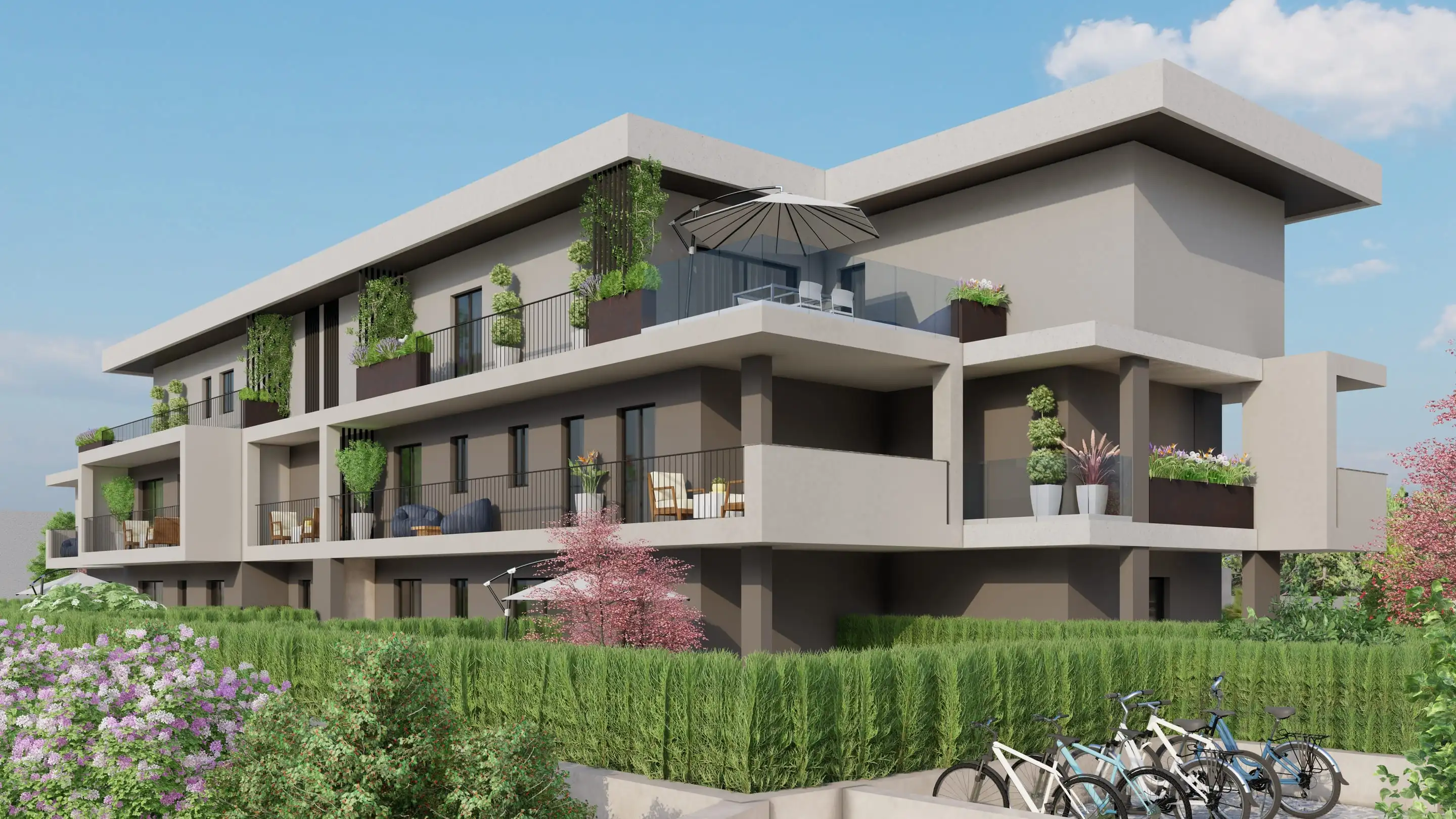 Residenza Modigliani a Cornate d’Adda: facciata con terrazzo all’ultimo piano e rastrelliera bici